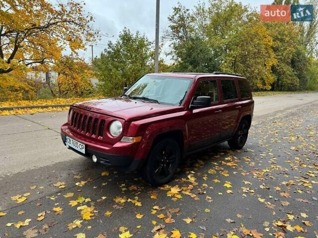 Красный Джип Патриот, объемом двигателя 2 л и пробегом 270 тыс. км за 9500 $, фото 5 на Automoto.ua