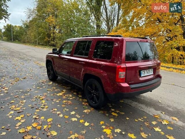 Красный Джип Патриот, объемом двигателя 2 л и пробегом 270 тыс. км за 9500 $, фото 4 на Automoto.ua