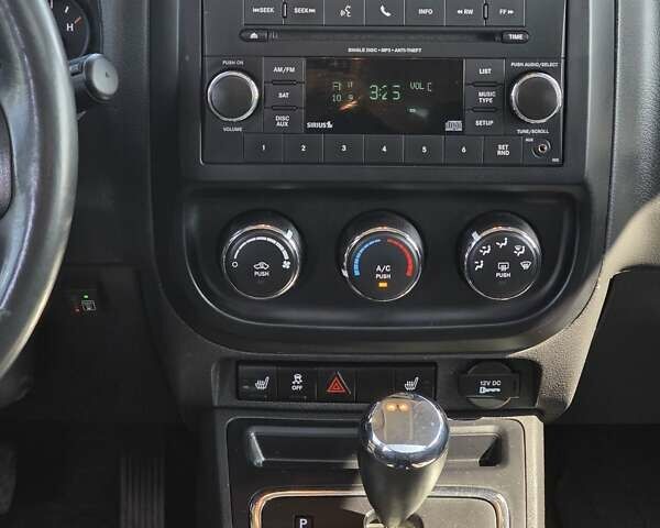 Красный Джип Патриот, объемом двигателя 2 л и пробегом 93 тыс. км за 12500 $, фото 5 на Automoto.ua