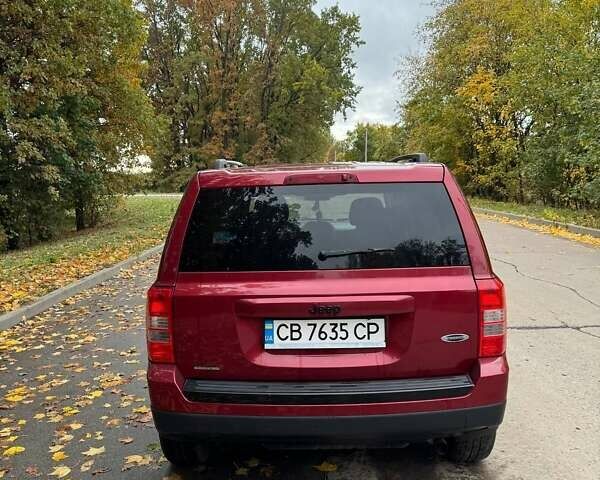 Красный Джип Патриот, объемом двигателя 2 л и пробегом 270 тыс. км за 9500 $, фото 3 на Automoto.ua