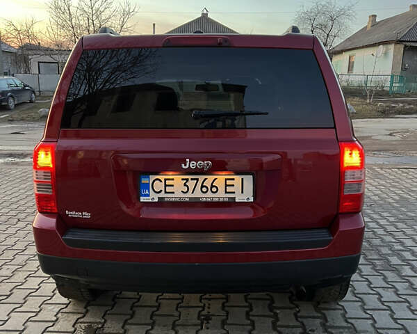 Червоний Джип Patriot, об'ємом двигуна 2.4 л та пробігом 150 тис. км за 10250 $, фото 6 на Automoto.ua