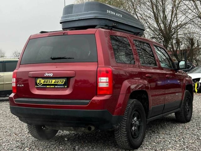 Красный Джип Патриот, объемом двигателя 2.4 л и пробегом 161 тыс. км за 8750 $, фото 5 на Automoto.ua