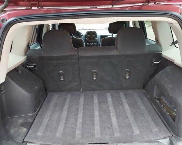 Красный Джип Патриот, объемом двигателя 2 л и пробегом 150 тыс. км за 8000 $, фото 11 на Automoto.ua