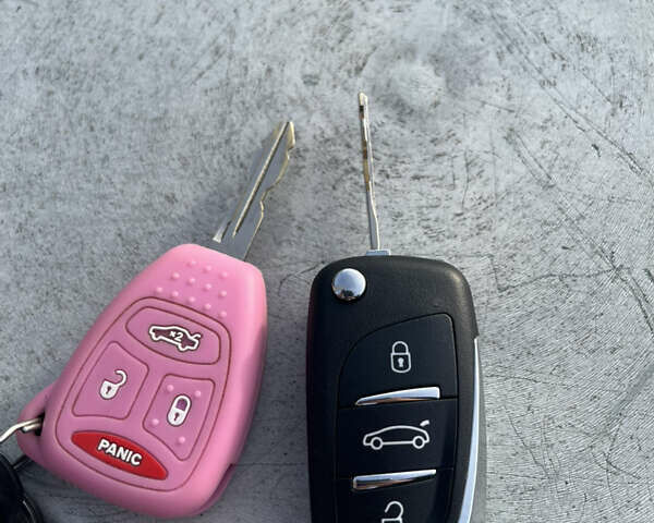 Красный Джип Патриот, объемом двигателя 2.36 л и пробегом 132 тыс. км за 11000 $, фото 17 на Automoto.ua