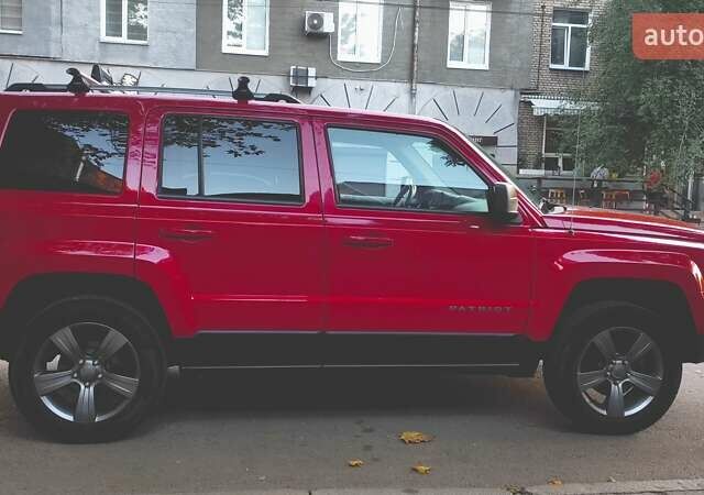 Красный Джип Патриот, объемом двигателя 2.36 л и пробегом 170 тыс. км за 12500 $, фото 5 на Automoto.ua
