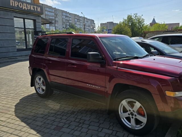 Красный Джип Патриот, объемом двигателя 2.4 л и пробегом 193 тыс. км за 8799 $, фото 7 на Automoto.ua