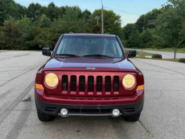 Красный Джип Патриот, объемом двигателя 2.4 л и пробегом 57 тыс. км за 7800 $, фото 1 на Automoto.ua