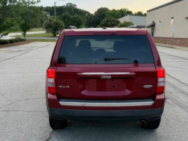 Красный Джип Патриот, объемом двигателя 2.4 л и пробегом 57 тыс. км за 7800 $, фото 5 на Automoto.ua