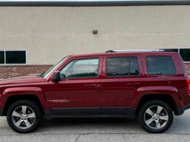 Красный Джип Патриот, объемом двигателя 2.4 л и пробегом 57 тыс. км за 7800 $, фото 3 на Automoto.ua