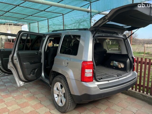 Серый Джип Патриот, объемом двигателя 2.4 л и пробегом 86 тыс. км за 12000 $, фото 2 на Automoto.ua