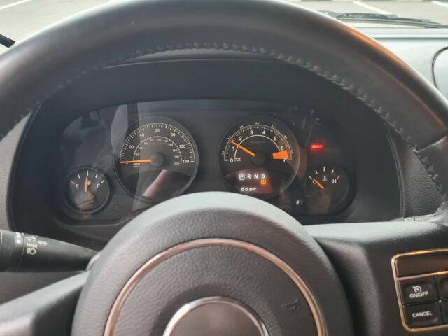 Серый Джип Патриот, объемом двигателя 2.4 л и пробегом 164 тыс. км за 10500 $, фото 2 на Automoto.ua