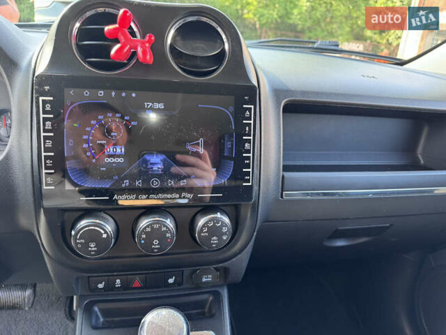 Серый Джип Патриот, объемом двигателя 2.36 л и пробегом 250 тыс. км за 9100 $, фото 2 на Automoto.ua