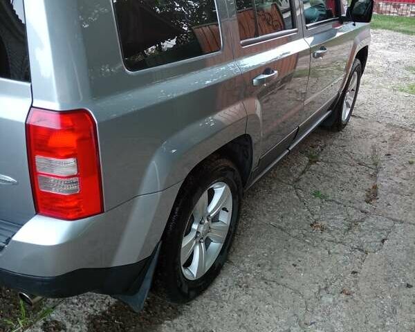 Серый Джип Патриот, объемом двигателя 2.4 л и пробегом 107 тыс. км за 10700 $, фото 5 на Automoto.ua