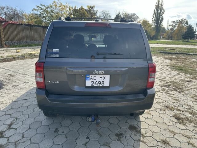 Серый Джип Патриот, объемом двигателя 2.4 л и пробегом 230 тыс. км за 9500 $, фото 2 на Automoto.ua