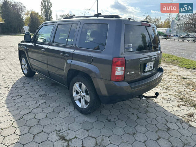 Серый Джип Патриот, объемом двигателя 2.36 л и пробегом 230 тыс. км за 9000 $, фото 3 на Automoto.ua