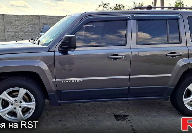 Серый Джип Патриот, объемом двигателя 2.4 л и пробегом 154 тыс. км за 11000 $, фото 2 на Automoto.ua