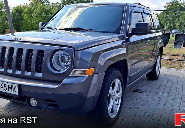Серый Джип Патриот, объемом двигателя 2.4 л и пробегом 154 тыс. км за 11000 $, фото 4 на Automoto.ua