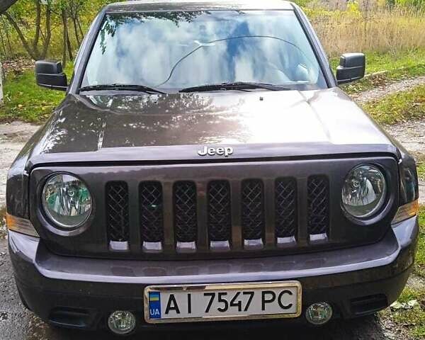 Серый Джип Патриот, объемом двигателя 2.36 л и пробегом 125 тыс. км за 11800 $, фото 1 на Automoto.ua
