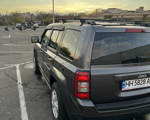 Серый Джип Патриот, объемом двигателя 2.36 л и пробегом 175 тыс. км за 11000 $, фото 4 на Automoto.ua