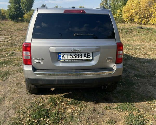 Серый Джип Патриот, объемом двигателя 2.4 л и пробегом 195 тыс. км за 11700 $, фото 4 на Automoto.ua