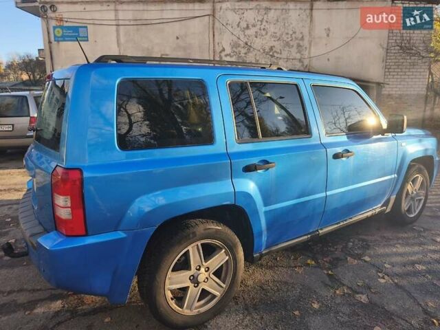 Синий Джип Патриот, объемом двигателя 2.36 л и пробегом 271 тыс. км за 6200 $, фото 1 на Automoto.ua