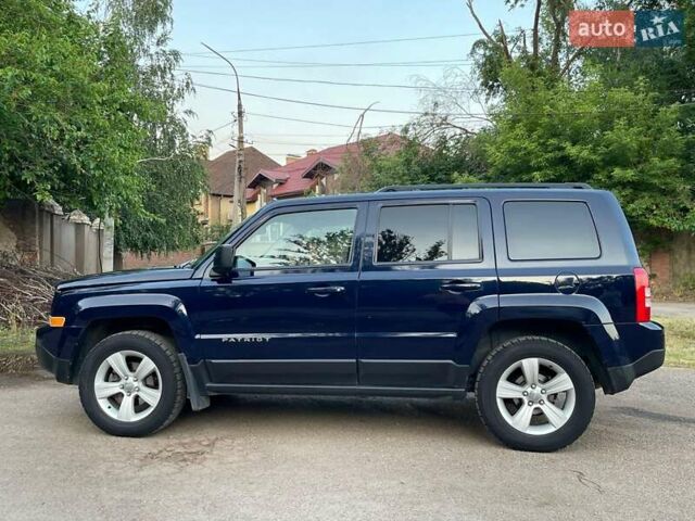 Синій Джип Patriot, об'ємом двигуна 2.36 л та пробігом 259 тис. км за 9500 $, фото 3 на Automoto.ua