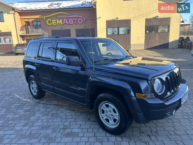 Синій Джип Patriot, об'ємом двигуна 2.36 л та пробігом 77 тис. км за 10300 $, фото 1 на Automoto.ua