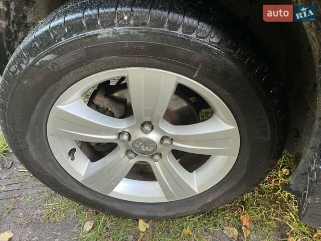 Синий Джип Патриот, объемом двигателя 2.36 л и пробегом 270 тыс. км за 8950 $, фото 1 на Automoto.ua