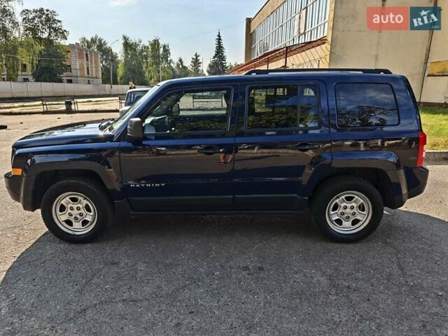 Синий Джип Патриот, объемом двигателя 2.36 л и пробегом 140 тыс. км за 9850 $, фото 2 на Automoto.ua