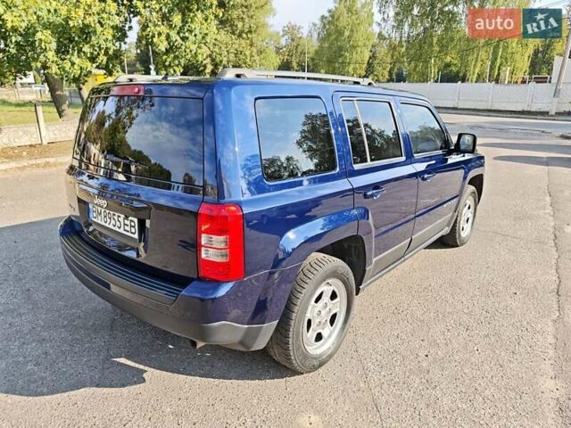 Синий Джип Патриот, объемом двигателя 2.36 л и пробегом 140 тыс. км за 9850 $, фото 4 на Automoto.ua