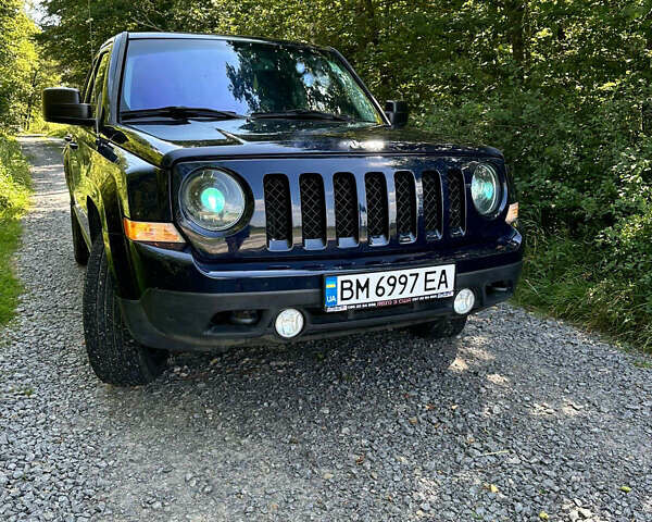 Синий Джип Патриот, объемом двигателя 2.36 л и пробегом 153 тыс. км за 12000 $, фото 4 на Automoto.ua