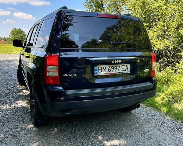 Синий Джип Патриот, объемом двигателя 2.36 л и пробегом 153 тыс. км за 12000 $, фото 6 на Automoto.ua