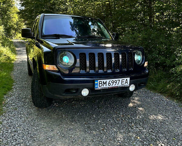 Синий Джип Патриот, объемом двигателя 2.36 л и пробегом 153 тыс. км за 12000 $, фото 1 на Automoto.ua