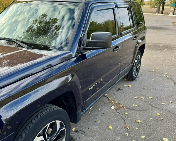 Синий Джип Патриот, объемом двигателя 2.36 л и пробегом 136 тыс. км за 11500 $, фото 4 на Automoto.ua