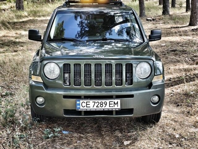 Зеленый Джип Патриот, объемом двигателя 2.4 л и пробегом 219 тыс. км за 6000 $, фото 1 на Automoto.ua