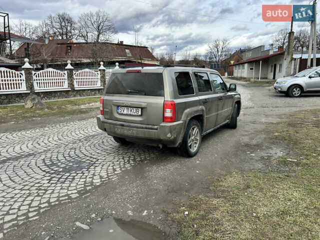 Зеленый Джип Патриот, объемом двигателя 2 л и пробегом 280 тыс. км за 4700 $, фото 3 на Automoto.ua