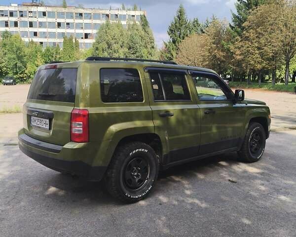 Зеленый Джип Патриот, объемом двигателя 2 л и пробегом 230 тыс. км за 9200 $, фото 6 на Automoto.ua