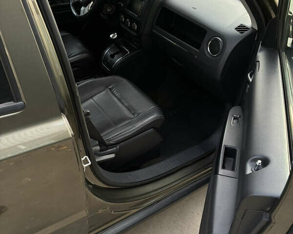 Зеленый Джип Патриот, объемом двигателя 2.36 л и пробегом 209 тыс. км за 11200 $, фото 6 на Automoto.ua