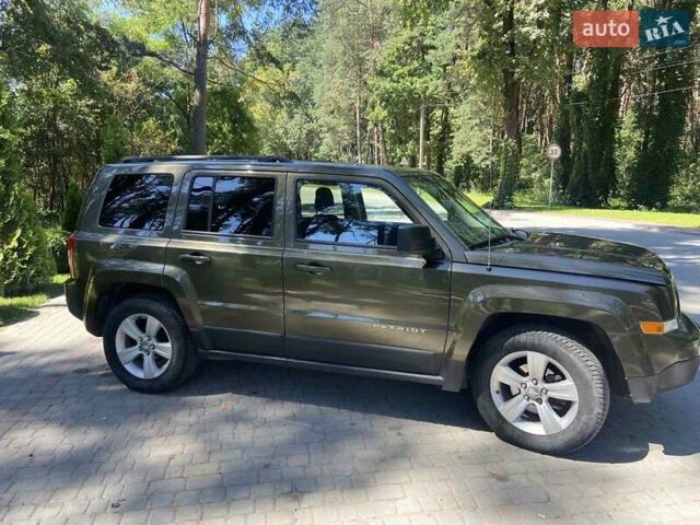 Зеленый Джип Патриот, объемом двигателя 2.36 л и пробегом 243 тыс. км за 9500 $, фото 2 на Automoto.ua