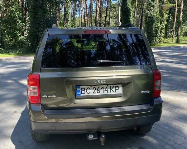 Зеленый Джип Патриот, объемом двигателя 2.36 л и пробегом 243 тыс. км за 9500 $, фото 5 на Automoto.ua