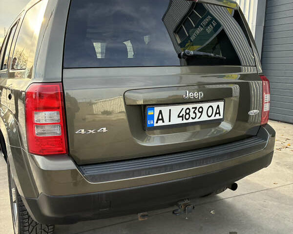 Зеленый Джип Патриот, объемом двигателя 2.36 л и пробегом 209 тыс. км за 11200 $, фото 4 на Automoto.ua