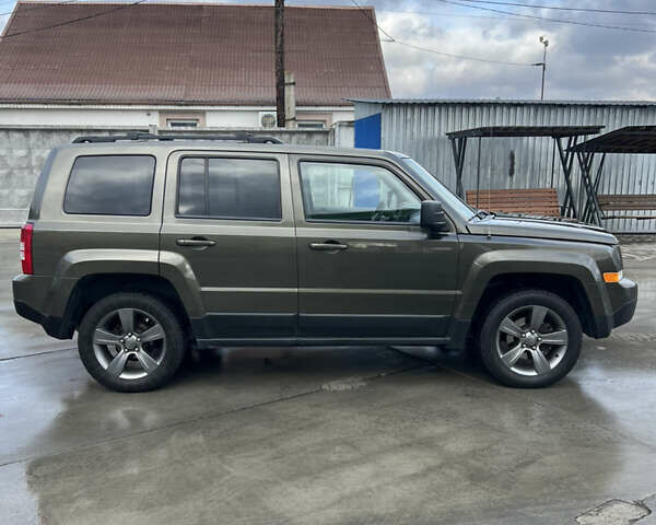 Зеленый Джип Патриот, объемом двигателя 2.36 л и пробегом 209 тыс. км за 11200 $, фото 6 на Automoto.ua