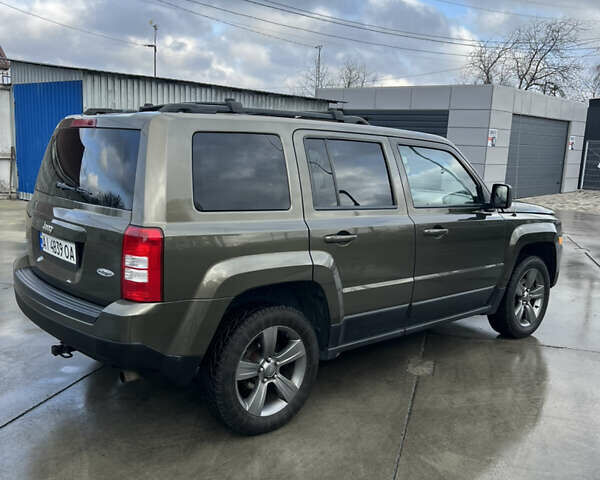 Зеленый Джип Патриот, объемом двигателя 2.36 л и пробегом 209 тыс. км за 11200 $, фото 8 на Automoto.ua