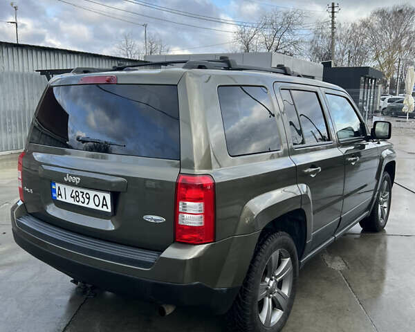 Зеленый Джип Патриот, объемом двигателя 2.36 л и пробегом 209 тыс. км за 11200 $, фото 9 на Automoto.ua