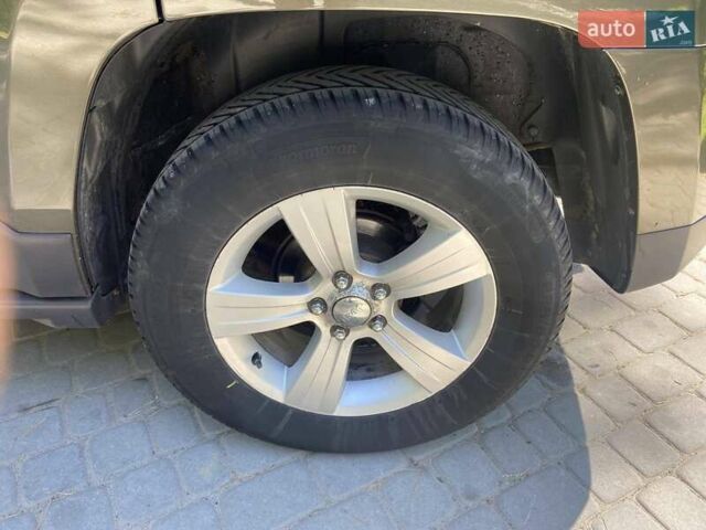 Зеленый Джип Патриот, объемом двигателя 2.36 л и пробегом 243 тыс. км за 9500 $, фото 8 на Automoto.ua