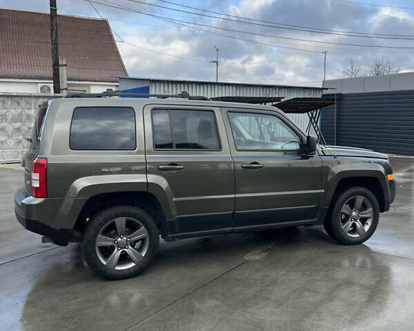 Зеленый Джип Патриот, объемом двигателя 2.36 л и пробегом 209 тыс. км за 11200 $, фото 7 на Automoto.ua