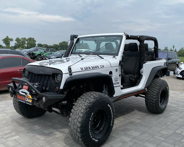 Білий Джип Wrangler, об'ємом двигуна 3.8 л та пробігом 147 тис. км за 22588 $, фото 4 на Automoto.ua