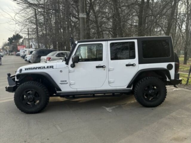 Білий Джип Wrangler, об'ємом двигуна 0.36 л та пробігом 77 тис. км за 36500 $, фото 2 на Automoto.ua