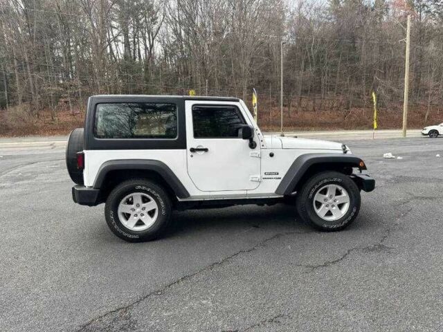 Білий Джип Wrangler, об'ємом двигуна 2 л та пробігом 55 тис. км за 8500 $, фото 4 на Automoto.ua