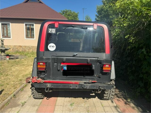 Чорний Джип Wrangler, об'ємом двигуна 0.25 л та пробігом 150 тис. км за 6800 $, фото 1 на Automoto.ua